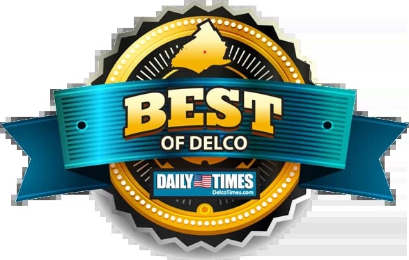 Best of Delco award badge with teal ribbon banner and gold circular seal from Daily Times publication